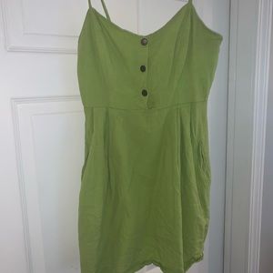 Green mini dress with pockets